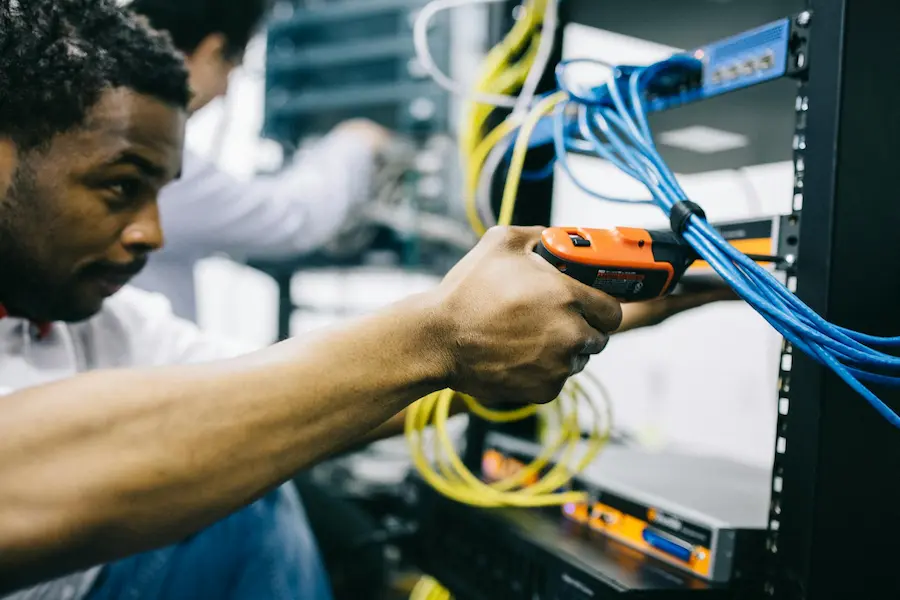 Field engineer installing equipment